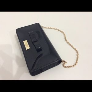 Black leather mini bag with short gold chain